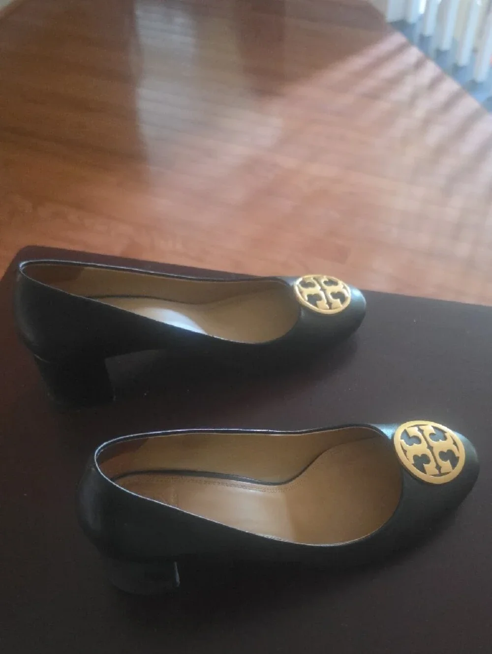 Black Leather Ballet Heels with Gold Emblem